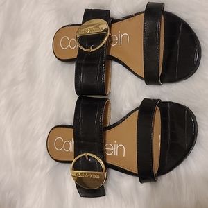 Calvin Klein snakeskin slipper